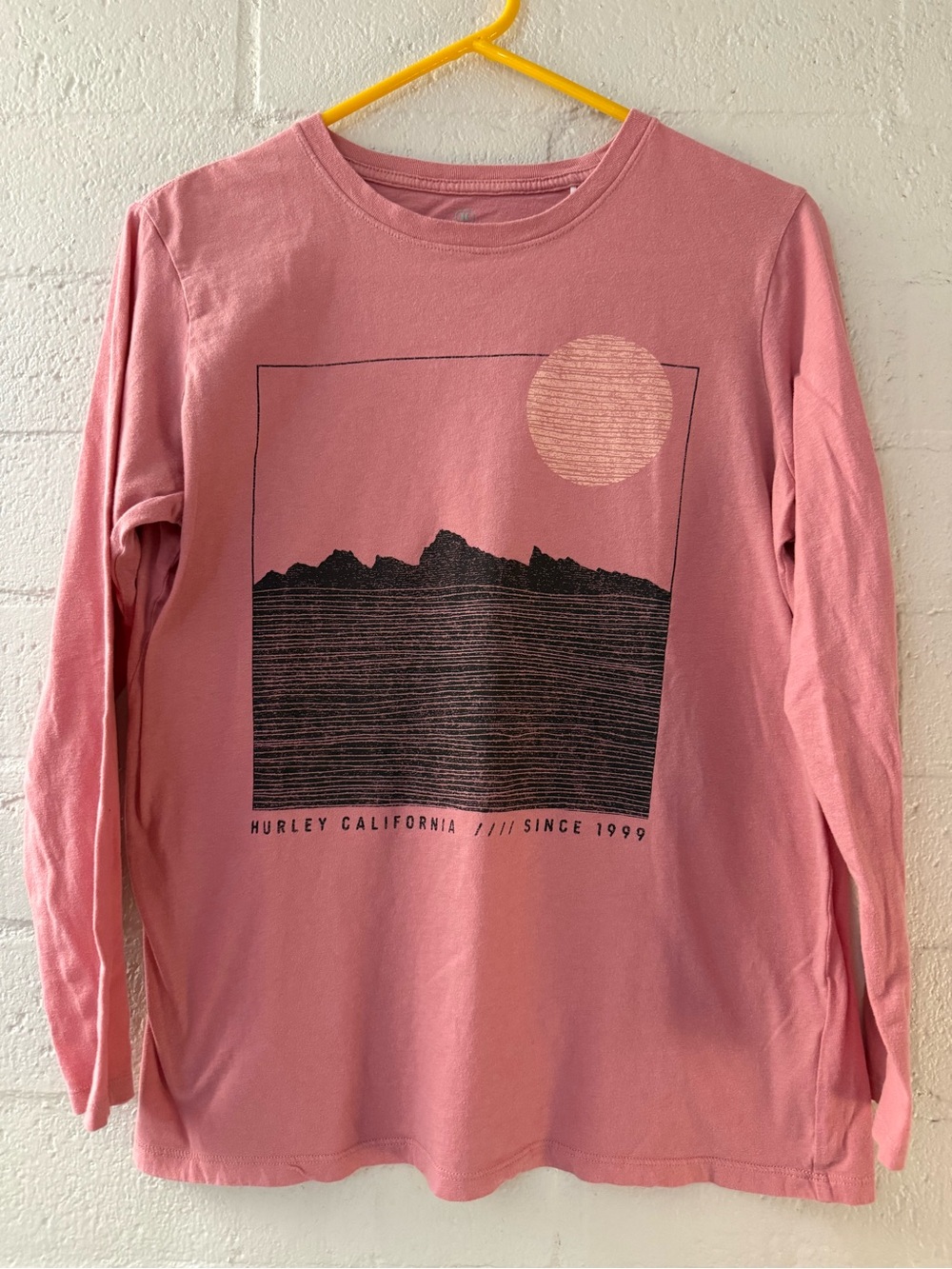 Hurley Women’s Pink Long Sleeve Graphic Tee with Mountains Sun